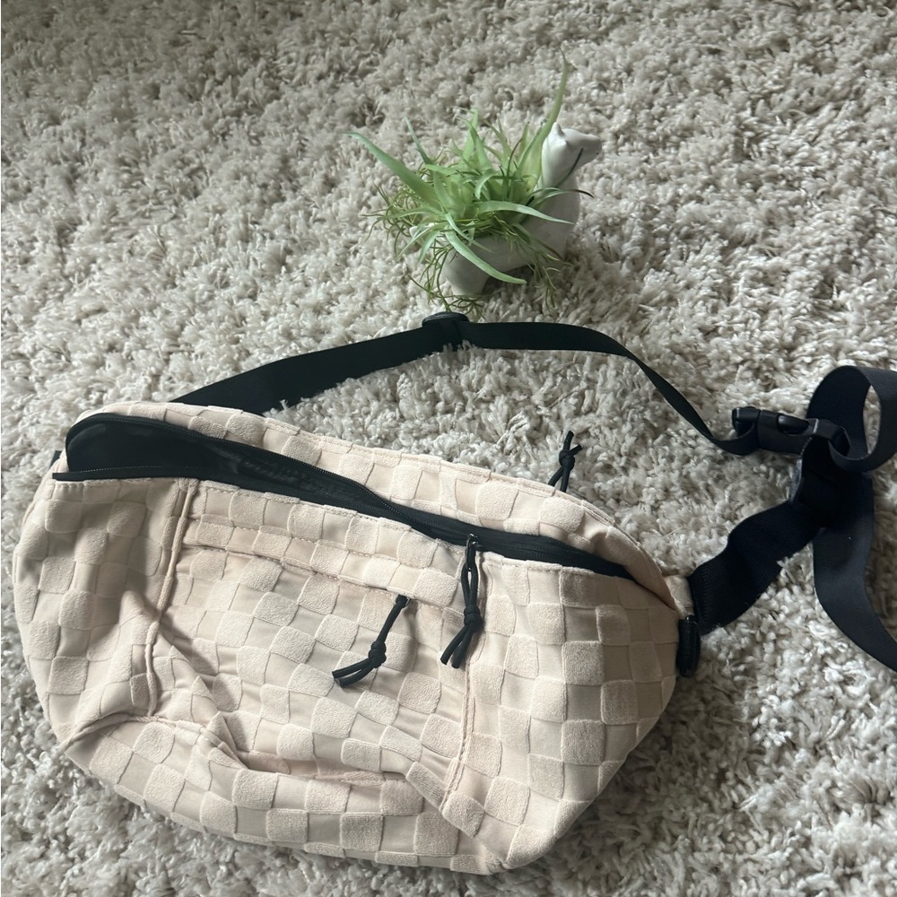 Cream beige and black waist bag with adjustable straps. Large size satch…